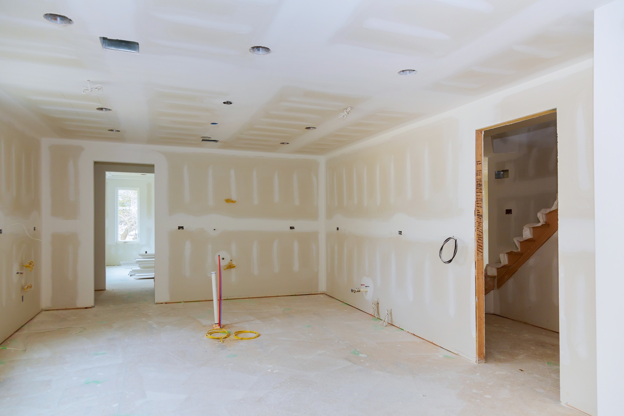 Drywall is hung in kitchen remodeling project Interior of apartment with materials during on the