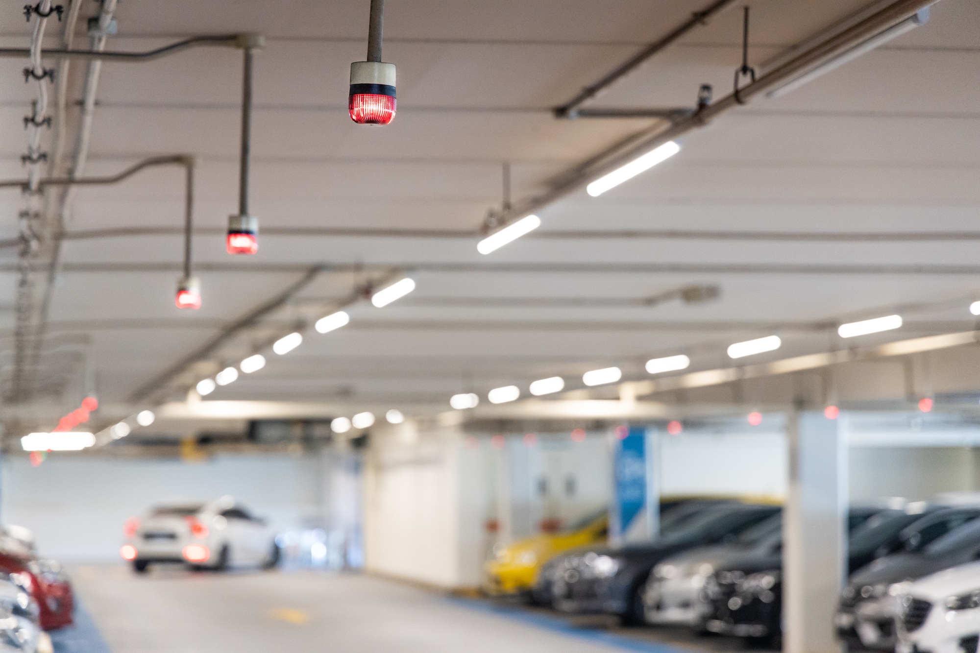 Smart car parking tracking system with lights signals vacancy availability